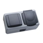 INTRERUPATOR+PRIZA CU CAPAC EXT. IP44 MAKEL